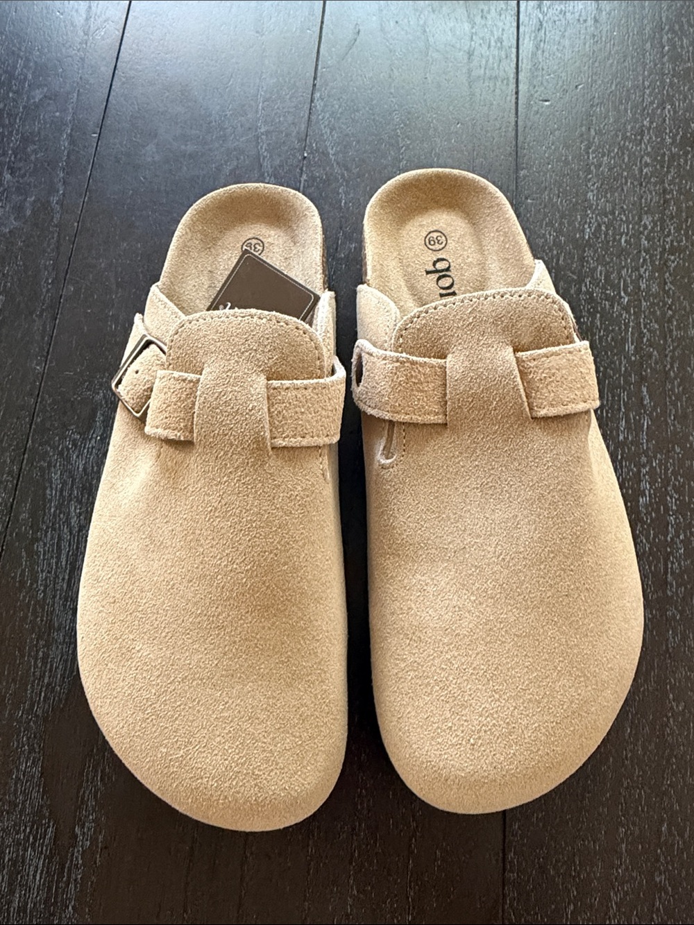 Women color Taupe Suede Clogs by Qomfort